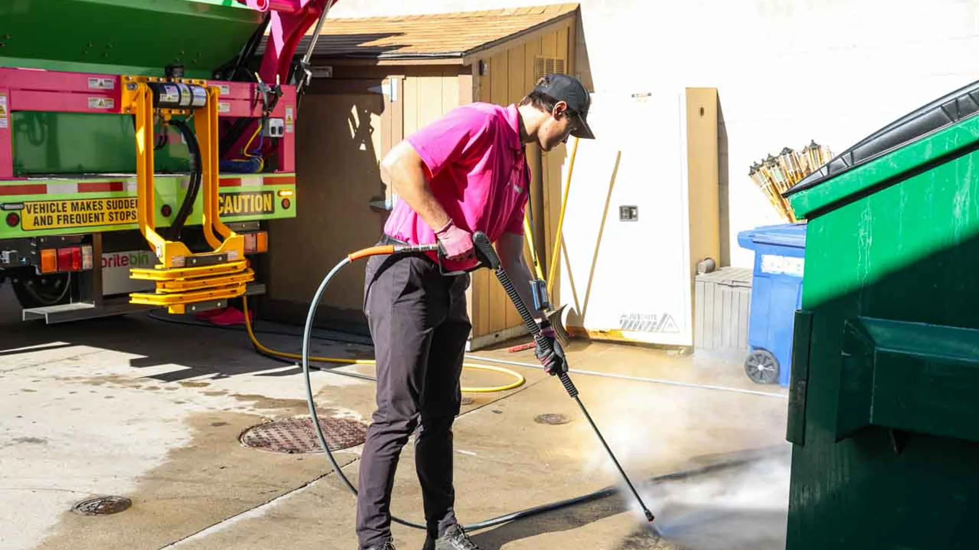 Britebin pressure washing a commercial loading dock and service area