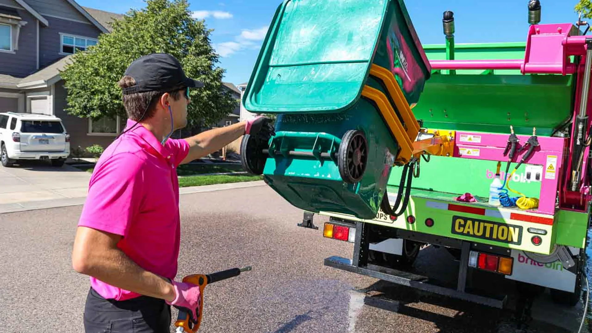 Empty trash and recycling bins left at the curb after municipal collection in Greater Denver