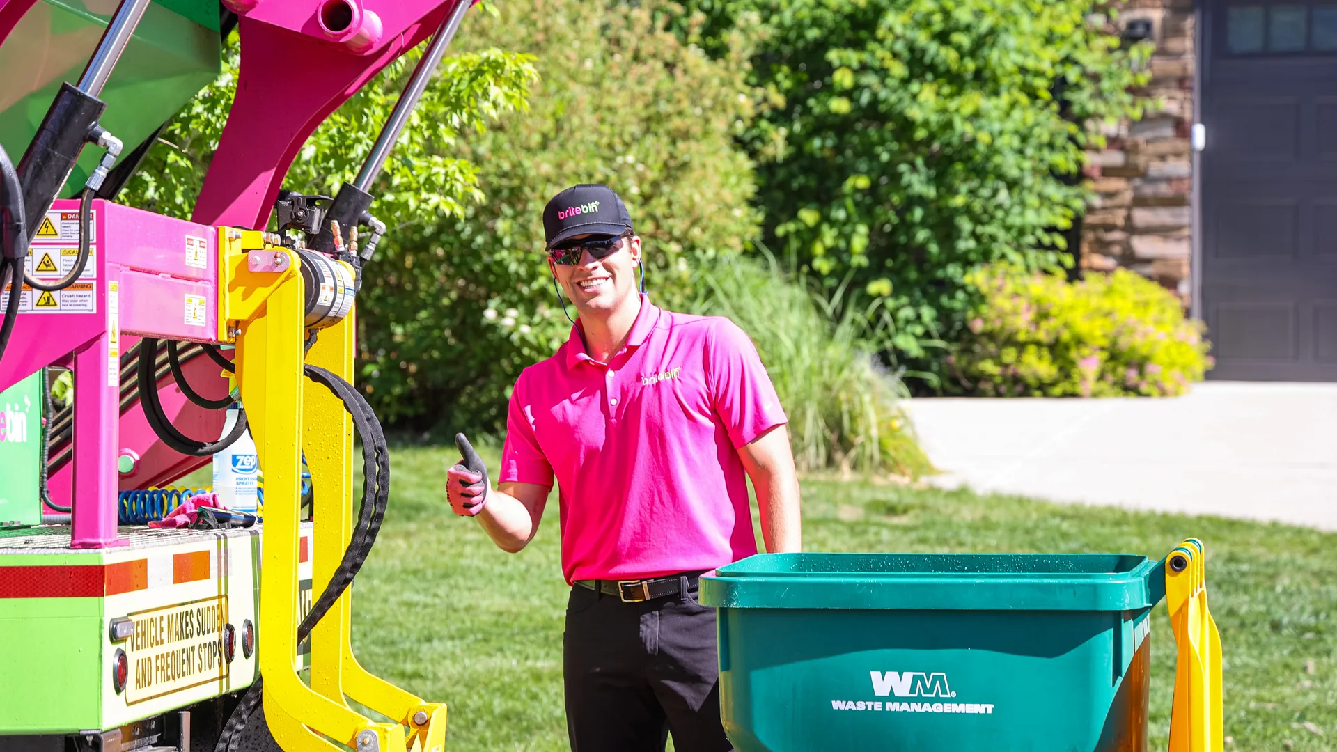 Britebin crew cleaning residential trash and recycle bins