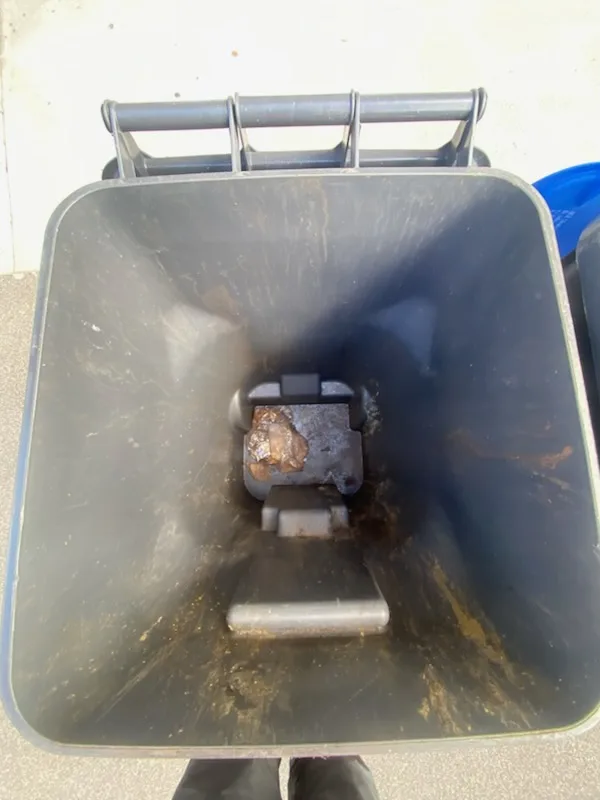 Residential trash bin in Denver before professional cleaning